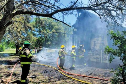 Neighborhood heroes help family escape house fire