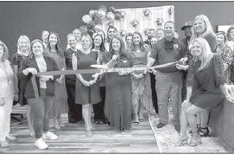 RIBBON CUT AT THE OLD 300 TITLE COMPANY
