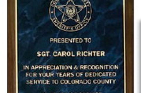 Retiring Colorado County Sheriff’s Office sergeant Carol Richter received honors for 42 years of service.