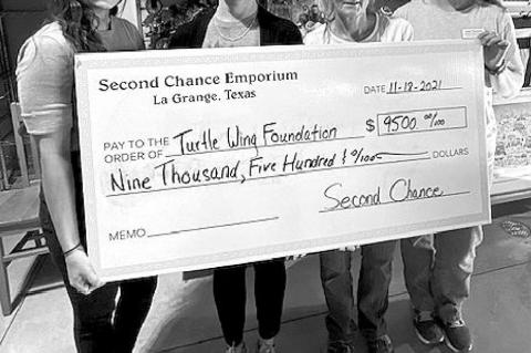 Turtle Wing receives donation from Second Chance