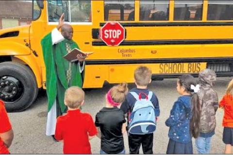 Bus blessing for St. Anthony School