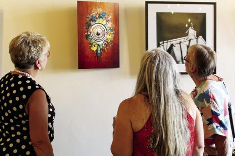 COMMUNITY GATHERS FOR ART SHOW OPENING