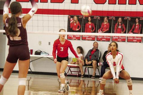 Lady Cards cruise to 13th straight win