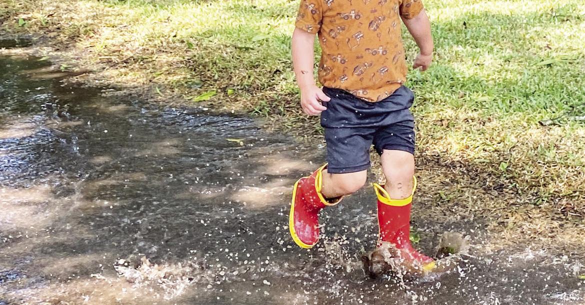 Knox Bohuslav, age 3, enjoyed splashing in the puddles left behind by the rain in Columbus last week. The recent rain was a welcome change from the hot, dry conditions of the current drought, but the county is still well below rainfall averages for the year. Citizen | Rae Drady