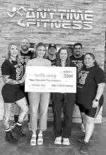 TURTLE WING RECEIVES CHECK FROM ANYTIME FITNESS