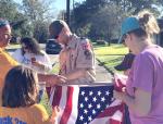 CUB SCOUTS REPLACE FLAGS FOR VETERANS DAY
