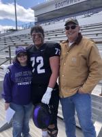 Wade Moore (Middle) taking a picture with his mom Melanie (left) and dad Todd after a game at Southwest Baptist University. Courtesy photo